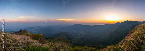 panoramic landscape beautiful mountain on sunset background and nature mist on forest , panorama Thailand