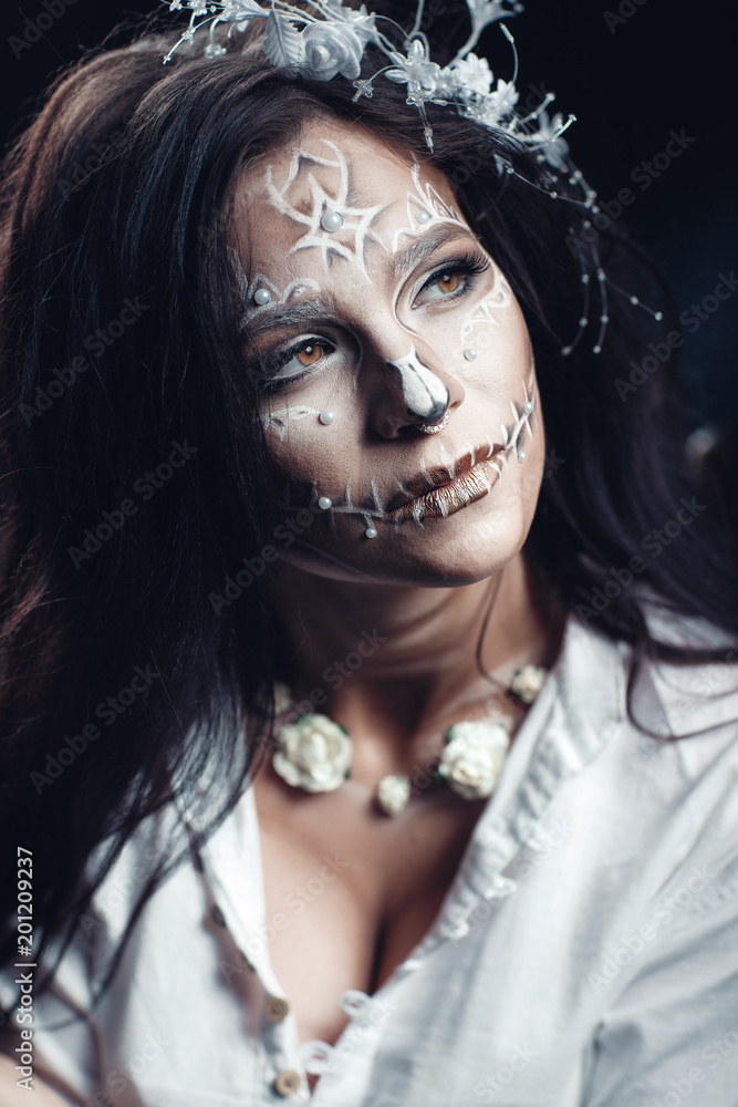 Girl with a stylized make-up of a dead bride Girl with a stylized make-up of a dead bride