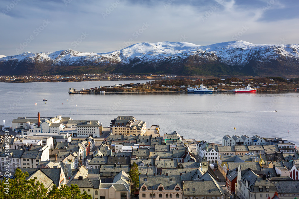Alesund town and snowy mountains in Norway