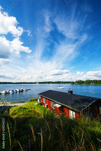 Bootshaus und Schärengarten in Vaxholm in Schweden photo
