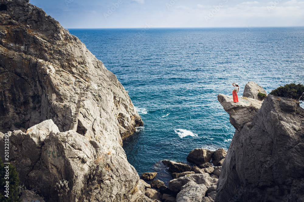 Crimea.Rock with a figure on the background of sights of