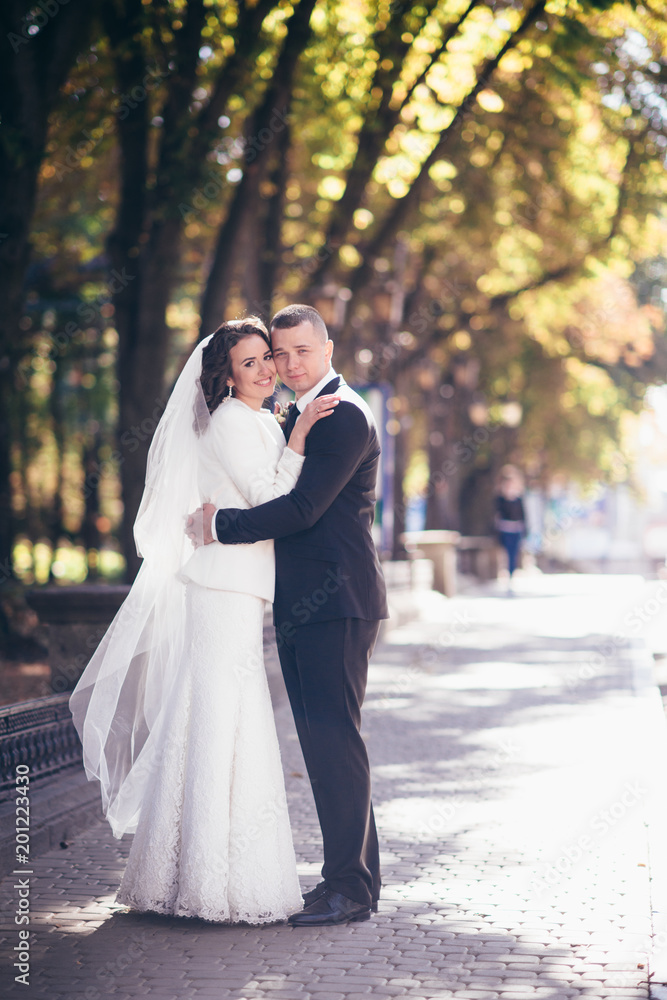 Naklejka premium Happy bride and groom on their wedding day