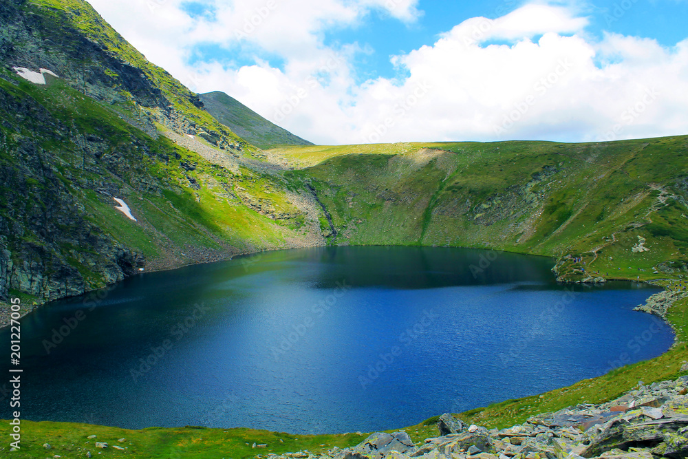 Fototapeta premium nature seven rila lakes the eye lake attraction close panoramic view spring season