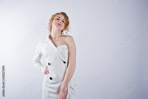 Curly hair girl isolated on white studio background.
