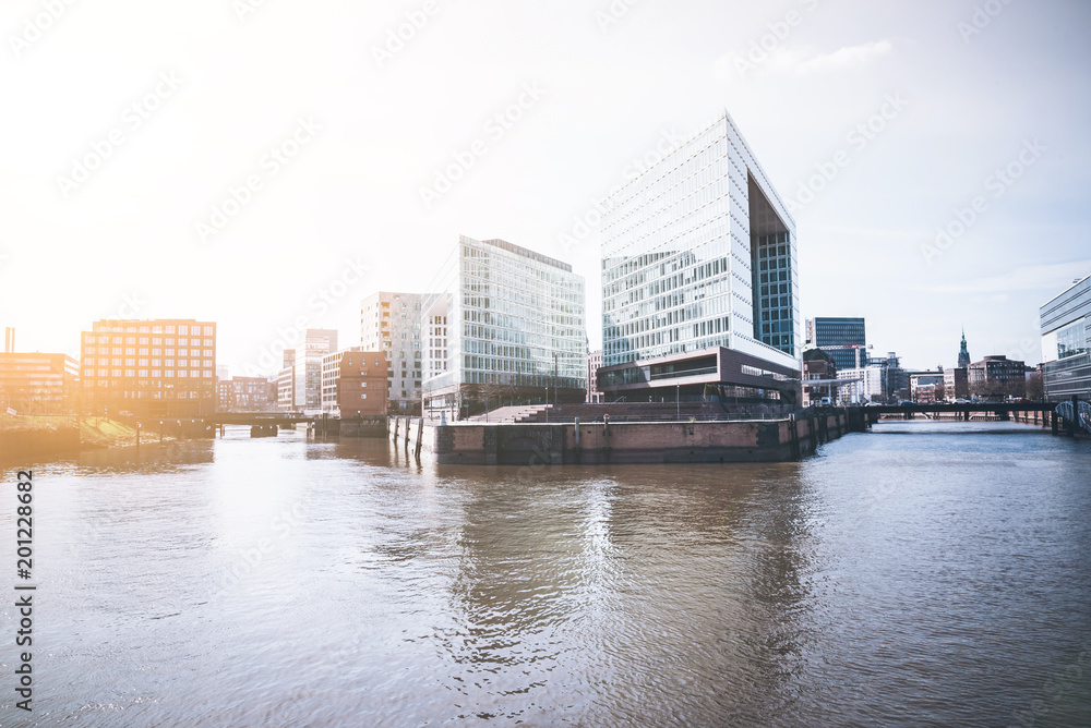modern office buildings at Hafencity district in Hamburg, Germany on clear sunny day