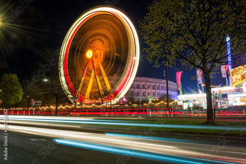 Spinning big wheel at spring fair in Nuremberg at night