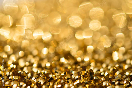 Christmas gold background with circles in bokeh