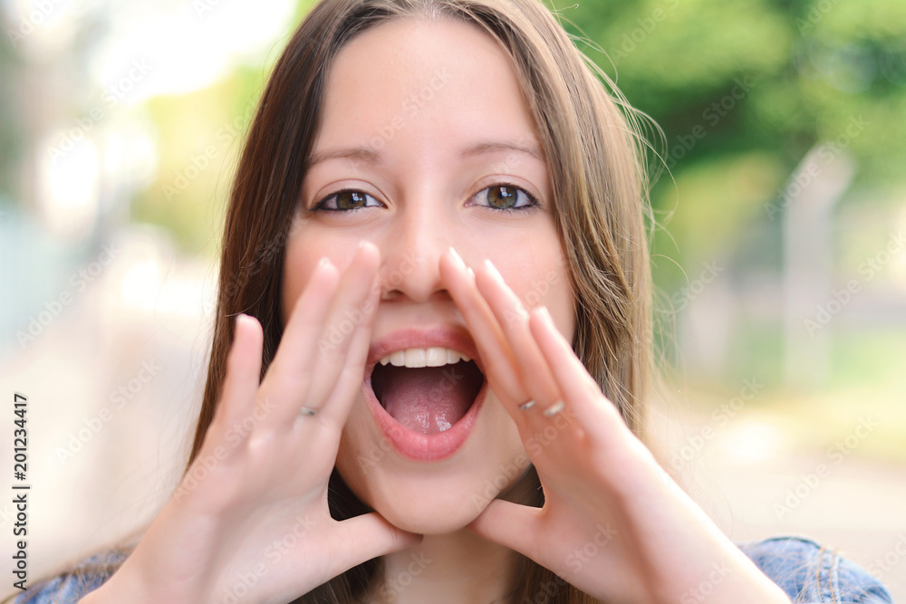 Young woman shouting and screaming. Young woman shouting and screaming.