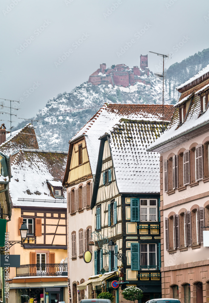 Houses in Ribeauville and the Saint Ulrich Castle in the Vosges Mountains. Alsace, France