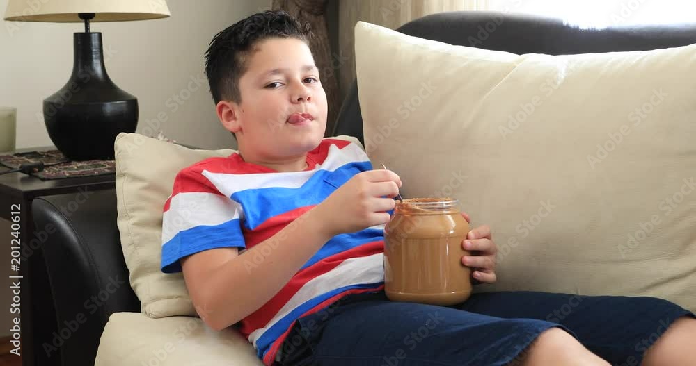 Painful preteen boy having abdominal pain, eating too much peanut