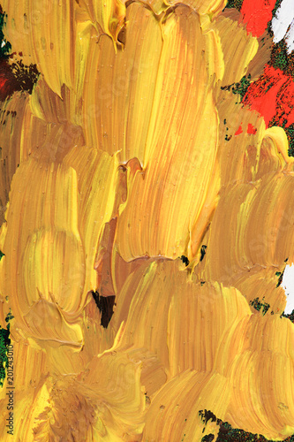 Closeup of paintstrokes with oilpaint in yellow and beige