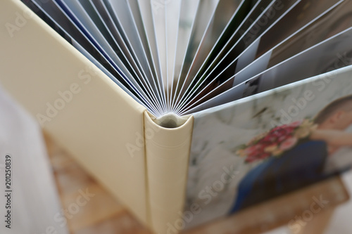 photo book of premium class large size, high-quality printing polygraphy, presentation of portfolio for photographer, wedding or family album