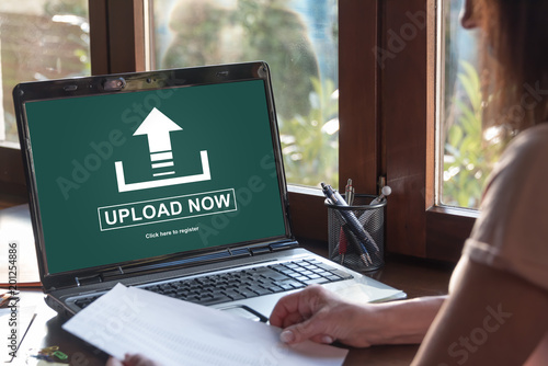 Upload concept on a laptop screen