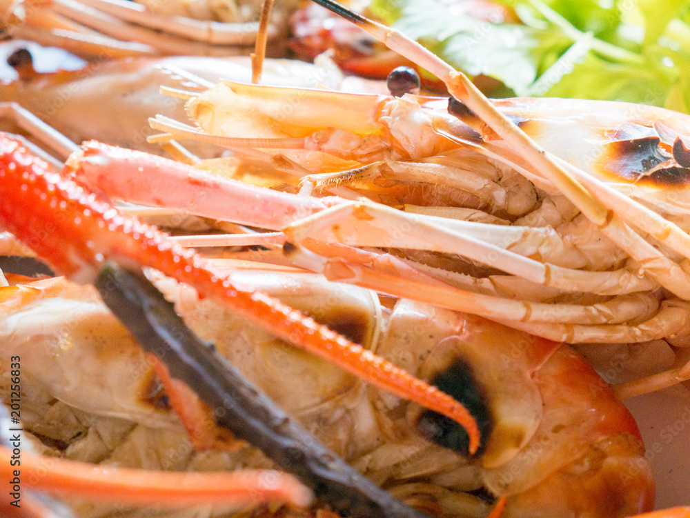 Grilled Prawns, Shrimp on a Plate with Dipping Spicy Seafood, Popular Thai Cuisine. Grilled Prawns, Shrimp on a Plate with Dipping Spicy Seafood, Popular Thai Cuisine.
