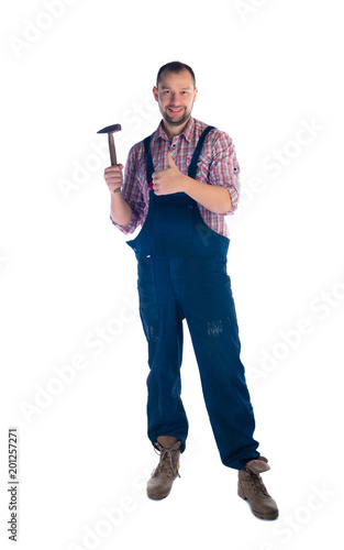 Workman with hammer standing on white background photo