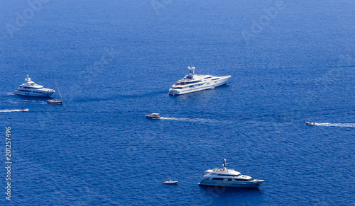 Blue sea and leisure boats seen from from Augustus Gardens,Isle of Capri, Italy