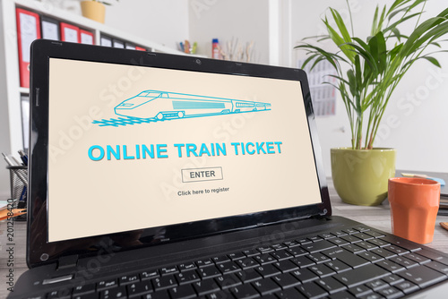 Online train ticket concept on a laptop
