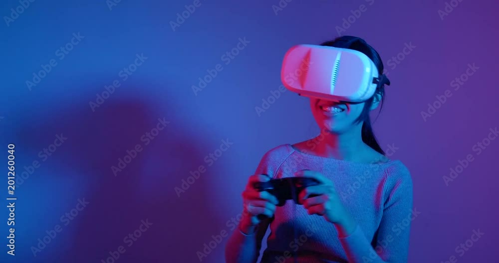 Excited woman playing VR Excited woman playing VR