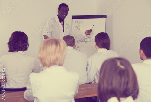 African American male giving presentation for medics