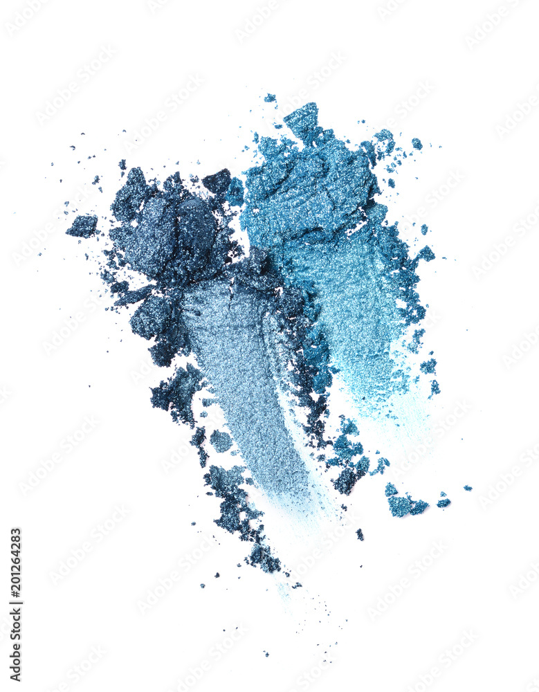 Smear of crushed shiny blue eyeshadow as sample of cosmetic product