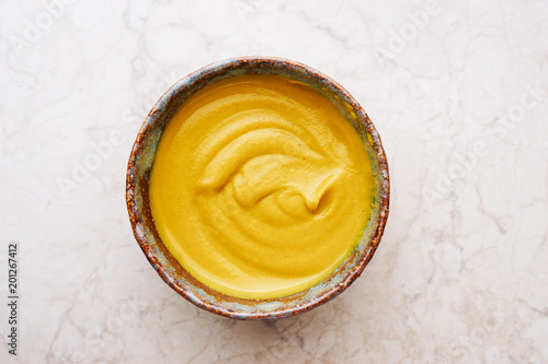 Obraz na płótnie Delicious homemade English mustard in bowl top view