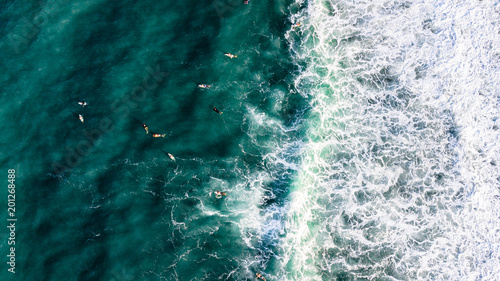 Εκτύπωση καμβά Aerial view of surfers riding a wave in Puerto Rico