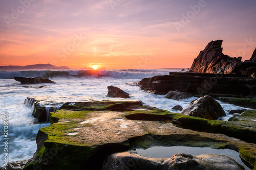 amazing sunset landscape at rocky beach