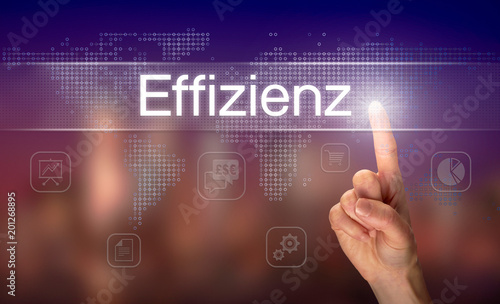 A businessman pressing a Efficiency "Effizienz" button in German on a futuristic computer  display
