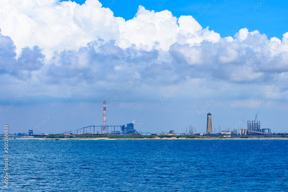 View from sea to industrial landscape of Kamarajar port, India
