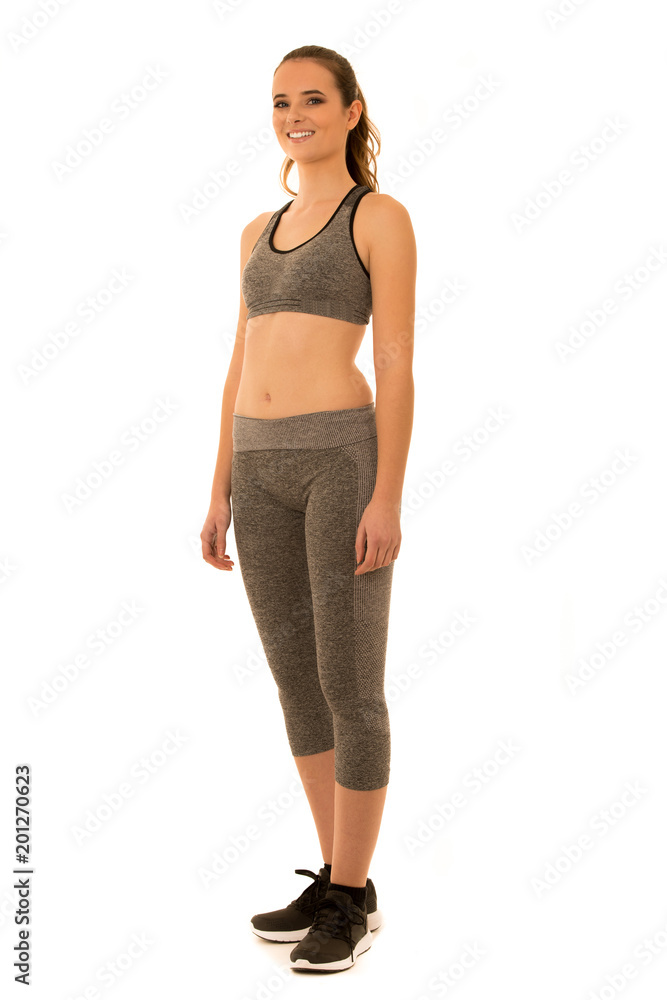 Beautiful young fit woman with great shape isolated over white background Beautiful young fit woman with great shape isolated over white background