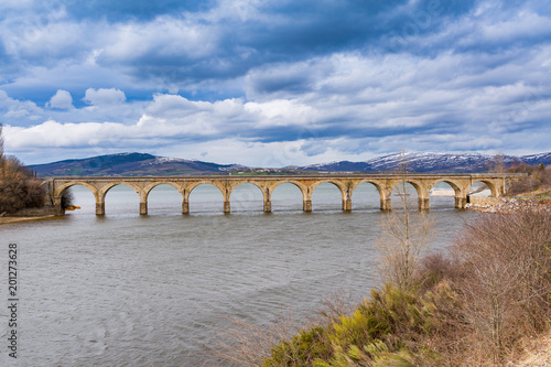 The railway bridge over the Arija reservoir, Burgos, Spain © AnderArrieta
