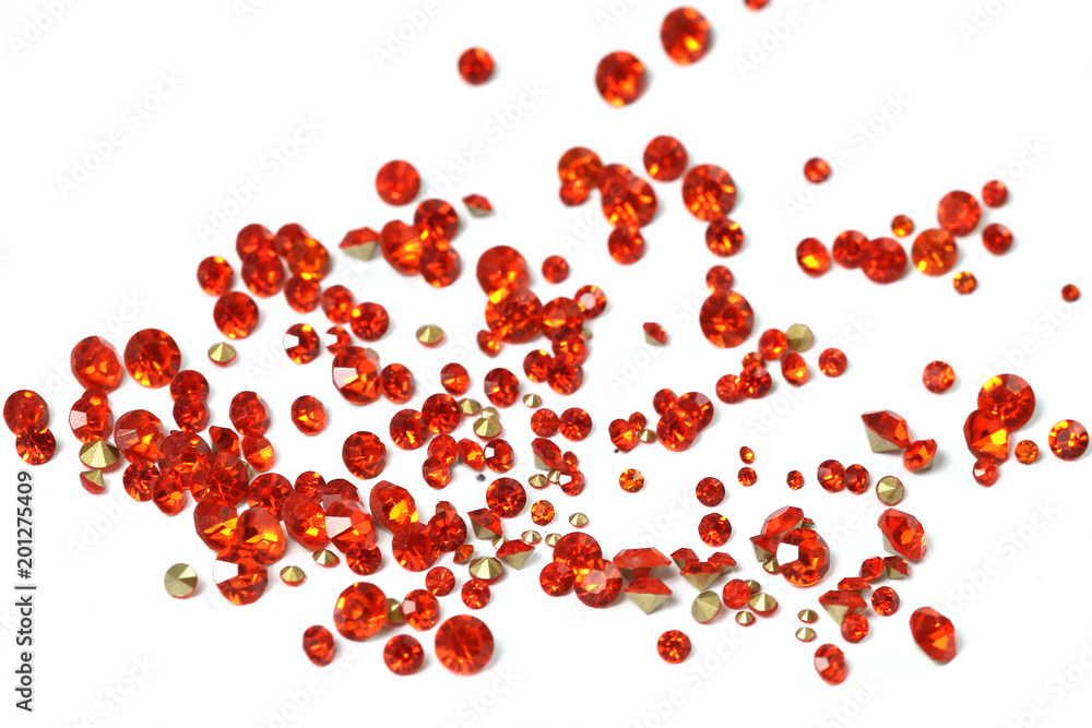 Many scattered rhinestones. On a white background Many scattered rhinestones. On a white background