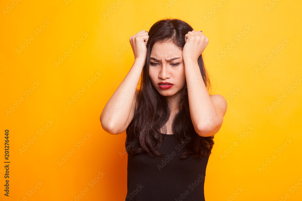Young Asian woman got sick and headache. Young Asian woman got sick and headache.
