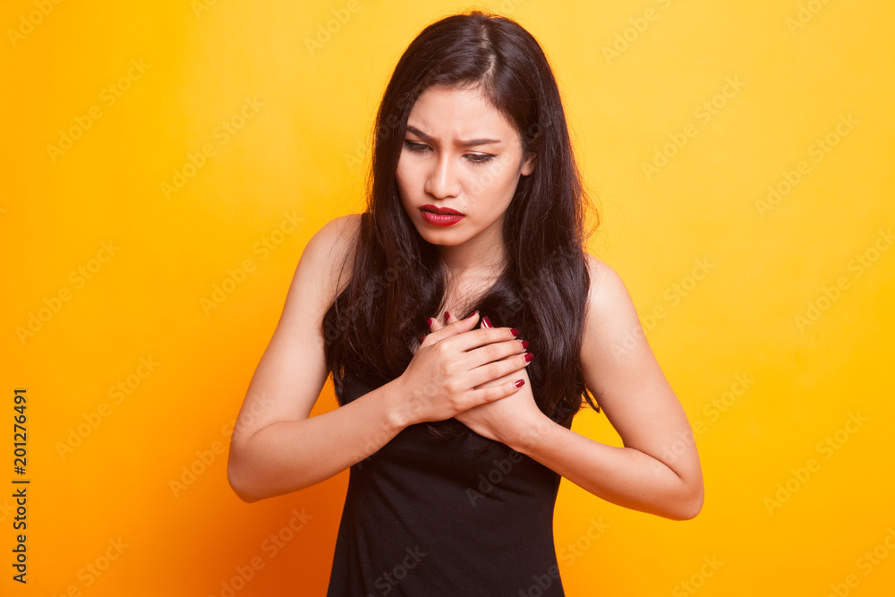Young Asian woman got chest pain. Young Asian woman got chest pain.