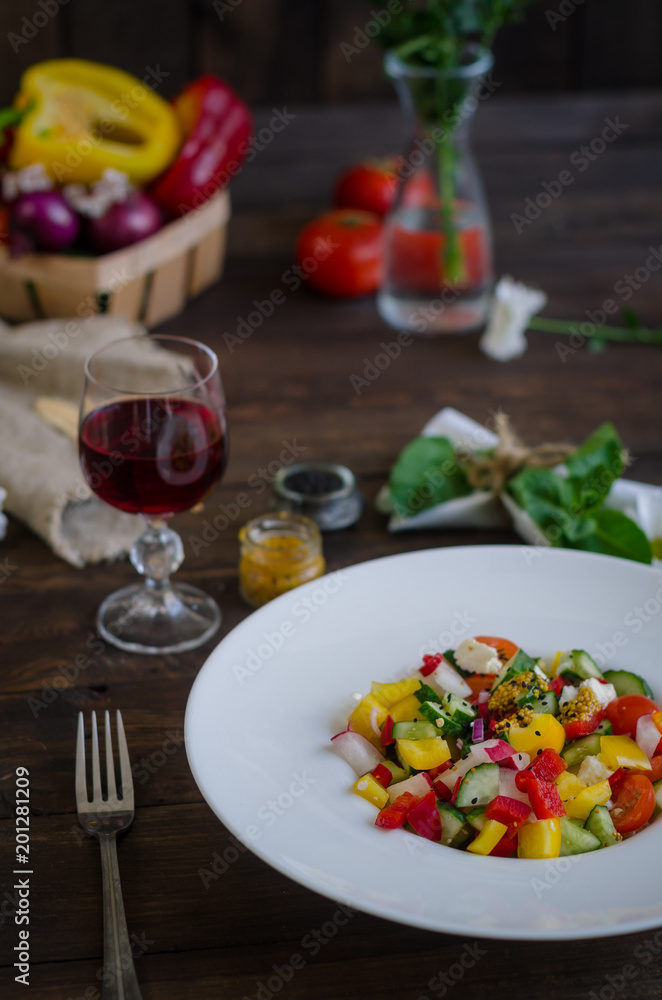 Vegetables salad on a white plate Vegetables salad on a white plate