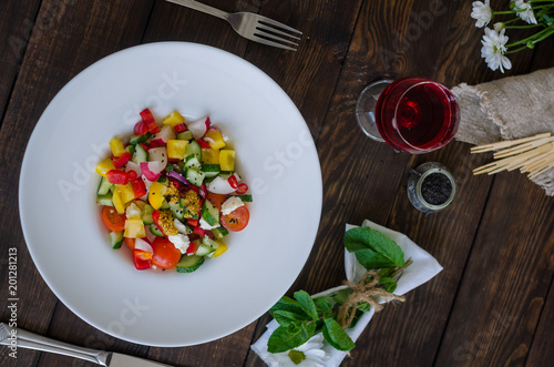 Vegetables salad on a white plate