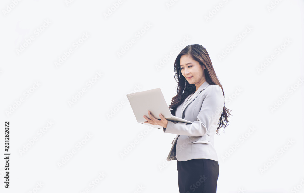Business woman using laptop computer on white background Business woman using laptop computer on white background