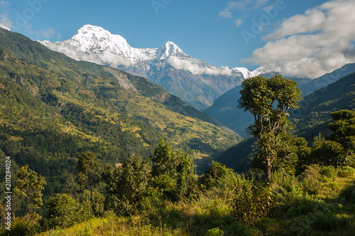 Annapurna South and small hill-slide settlements from Chainabatthi, Nepal