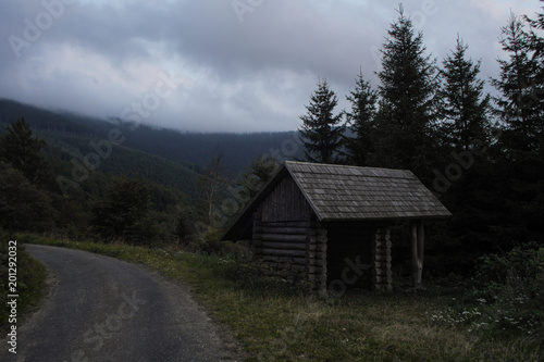 simple wooden cabin used as a hiking shelter, czech republic © listercz