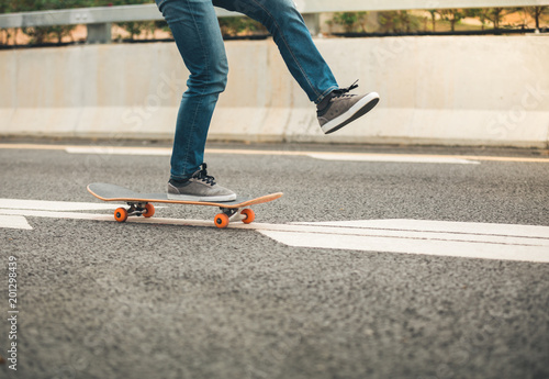 Skateboarder sakteboarding on highway © lzf