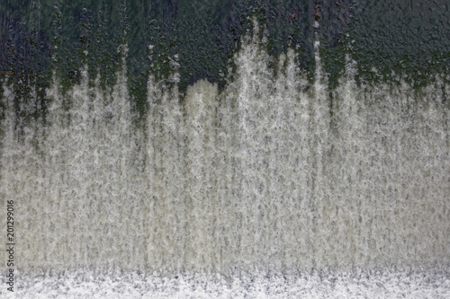 Water pouring down from a dam