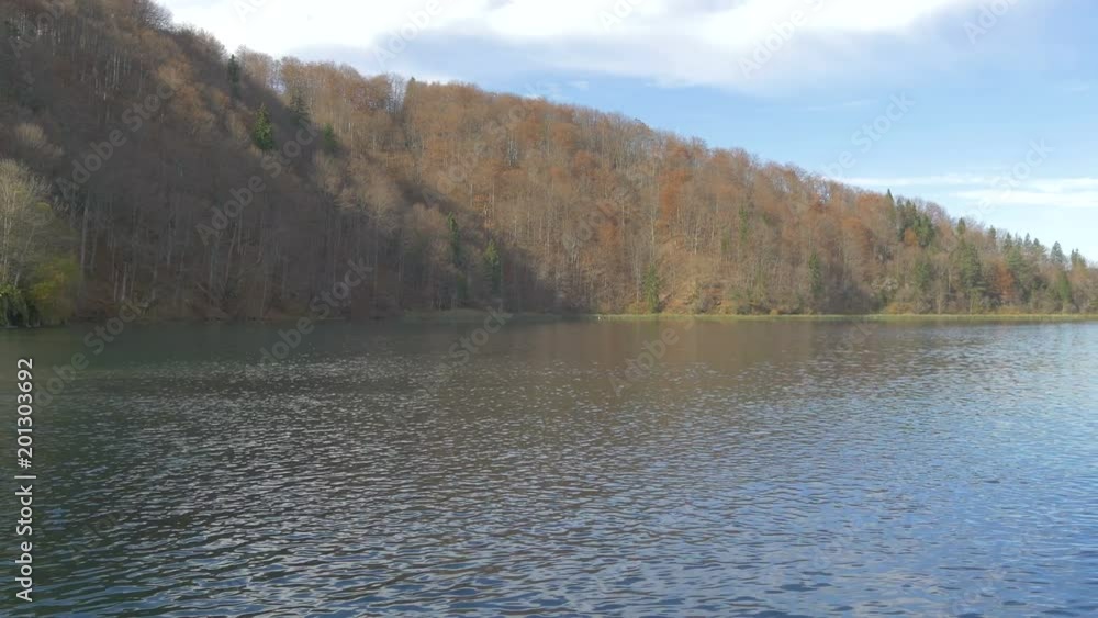 Lake surrounded by forested hills in Plitvice Park Lake surrounded by forested hills in Plitvice Park