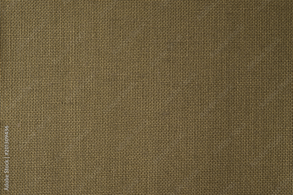 A textured background of olive green burlap A textured background of olive green burlap