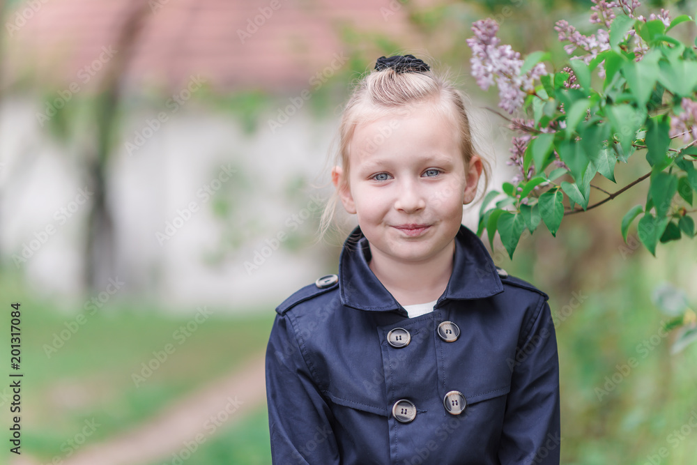 portrait of a beautiful blond girl looking straight into the camera portrait of a beautiful blond girl looking straight into the camera