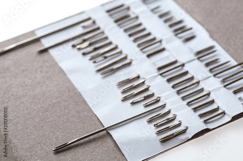 Photo of hand-sewing needles types. Close-up view