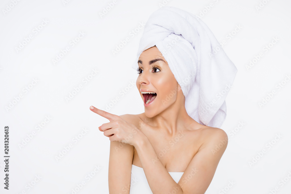 Beautiful smiling woman with a towel on her head after showering. Cosmetology. Women Health Beautiful smiling woman with a towel on her head after showering. Cosmetology. Women Health