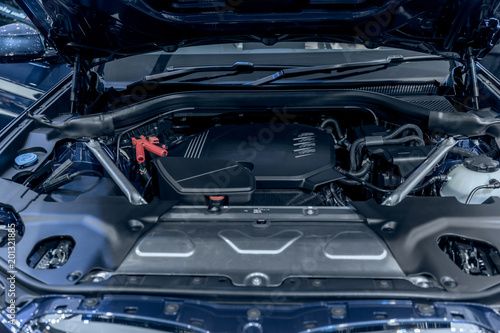 new car engine under vehicle hood © Quality Stock Arts