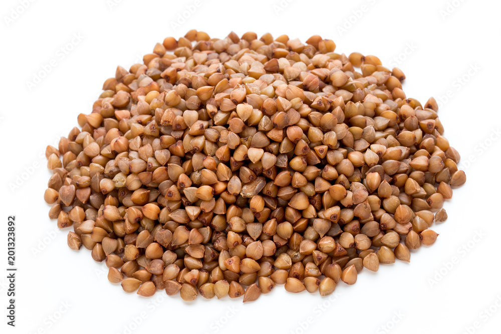 Buckwheat grains isolated on the white background. Buckwheat grains isolated on the white background.