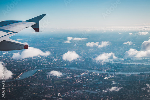 aerial view from the airplane over london central city and river themse