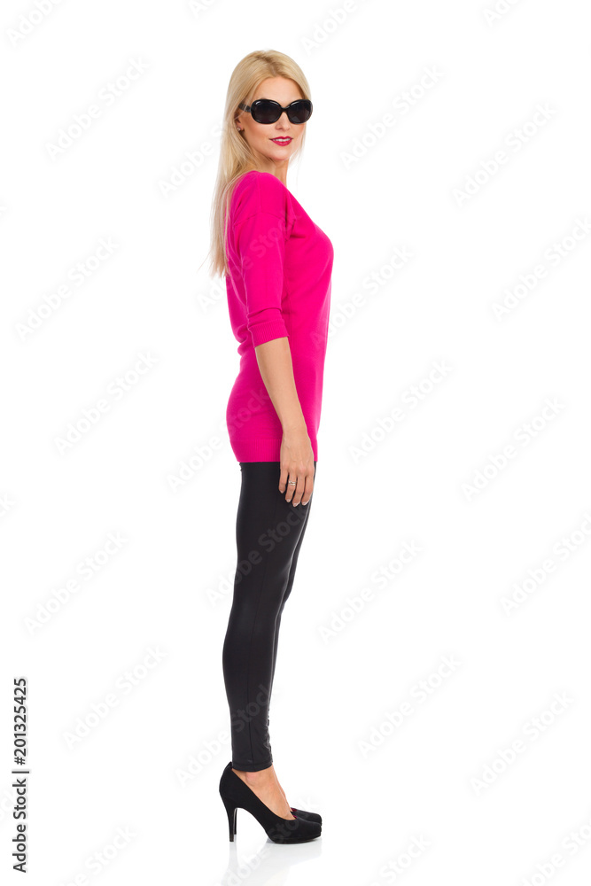 Beautiful Blond Woman Is Looking At Camera. Side View. Isolated On White Beautiful Blond Woman Is Looking At Camera. Side View. Isolated On White